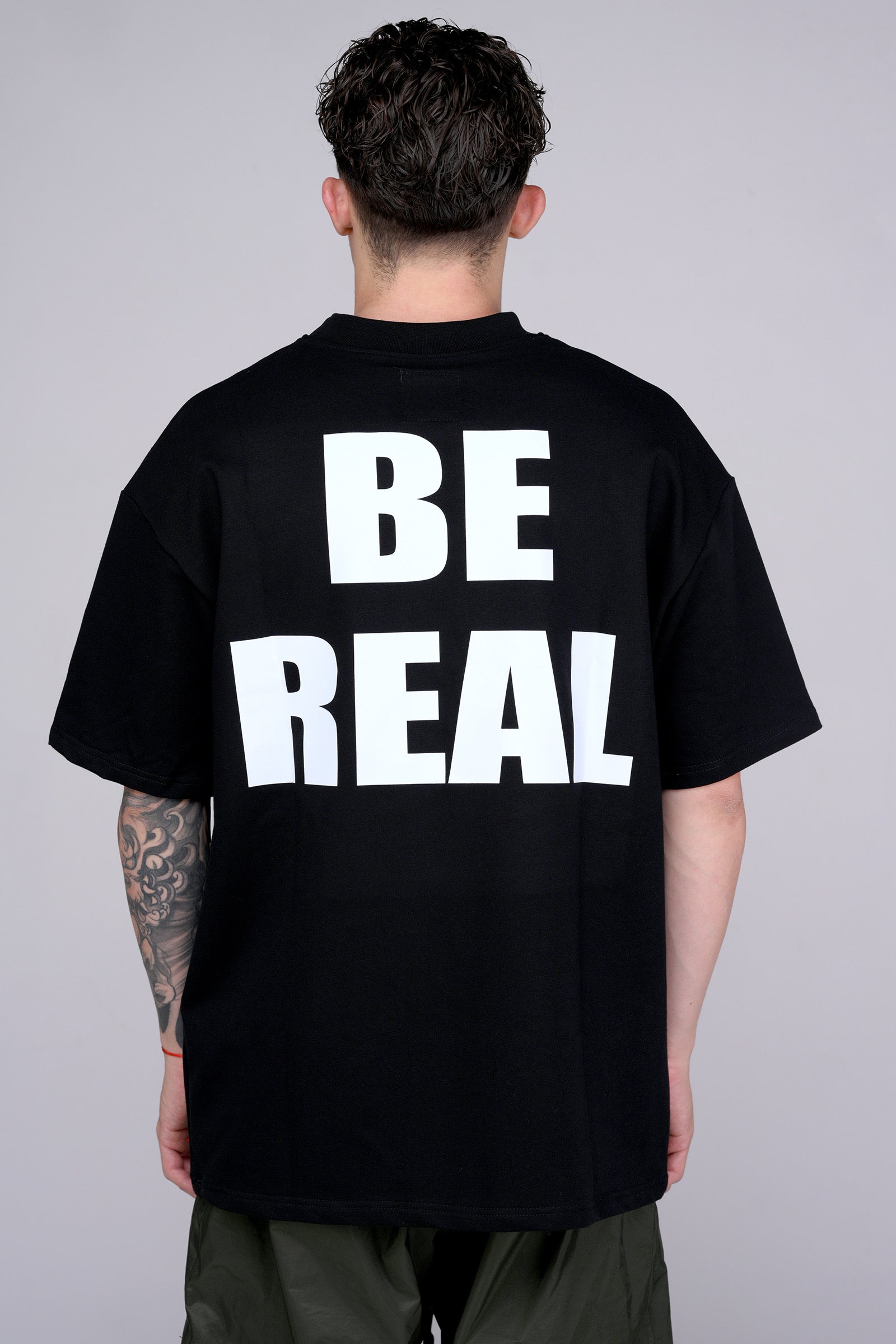 Black "Be Real" T-Shirt